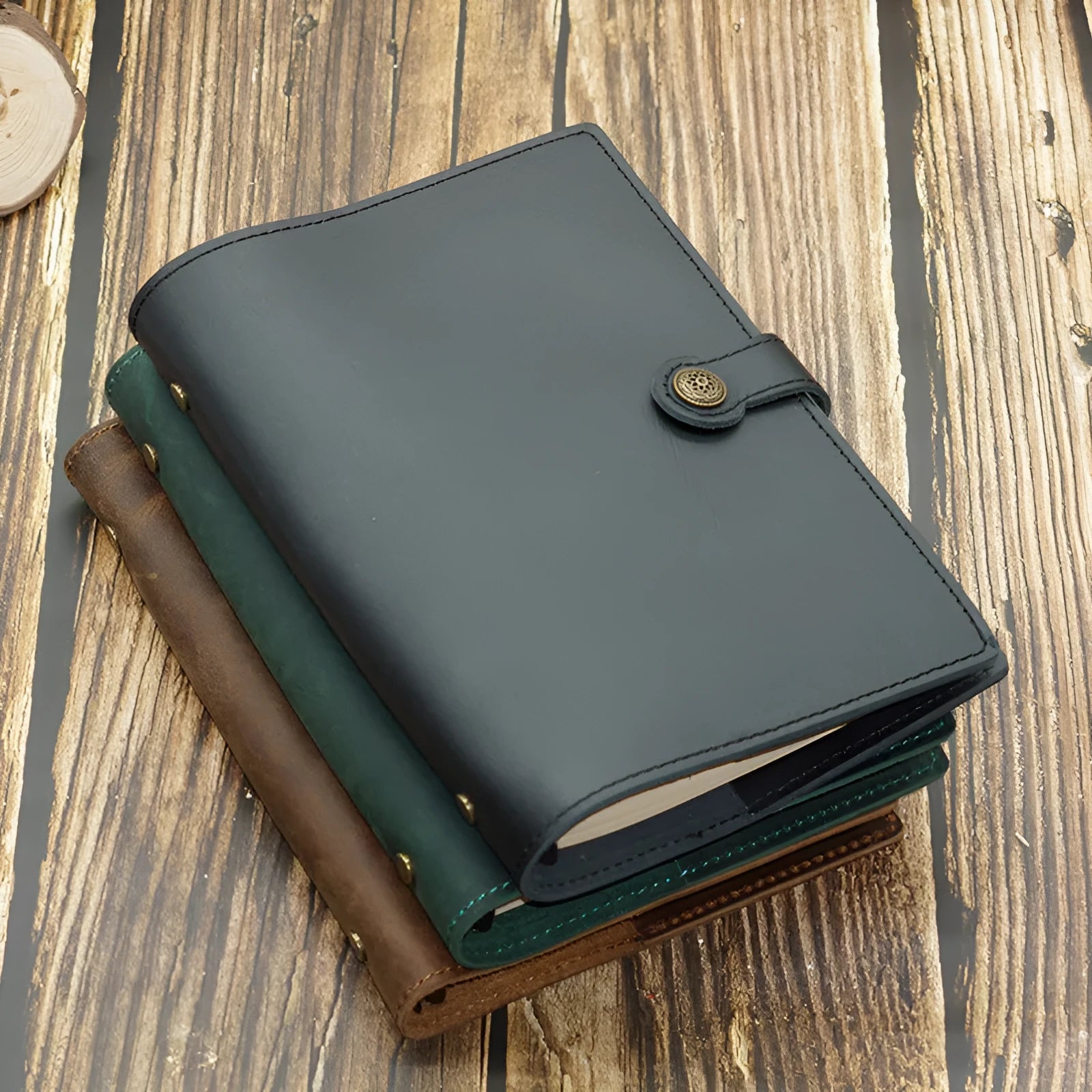A5 handmade cowhide notebook with genuine leather cover in Crazy Horse Brown, opened on a table