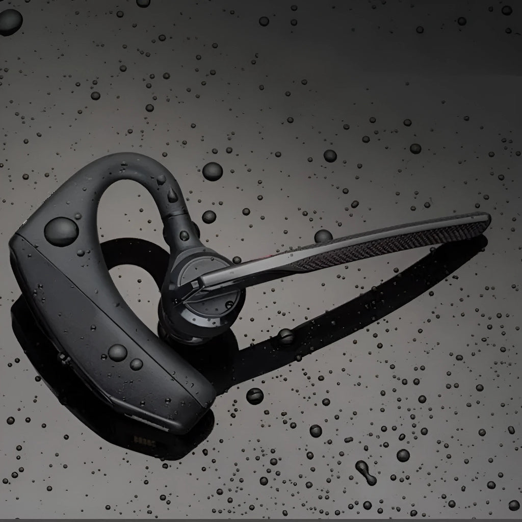 Black plastic Bluetooth sports headphones showing a battery display and USB charging port.