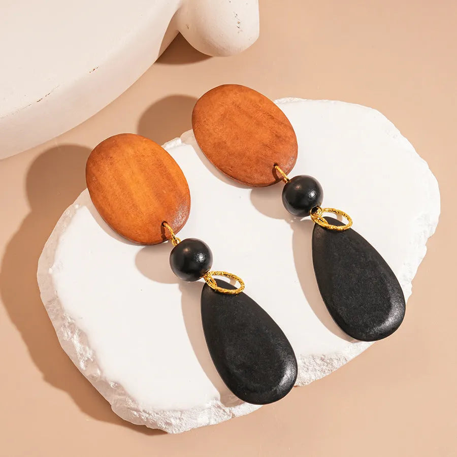 Brown black wooden ellipse earrings with silver needle fittings retro European style