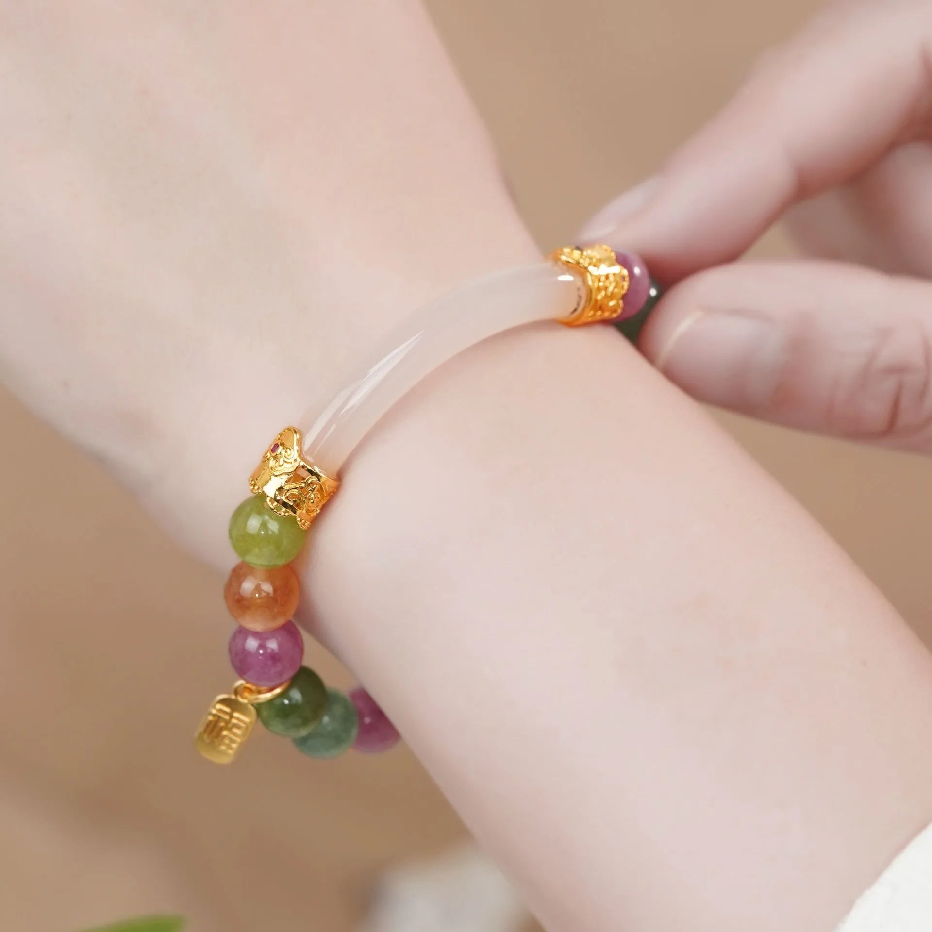 Women's tourmaline half bracelet with rainbow electroplated colour accents on natural stone beads