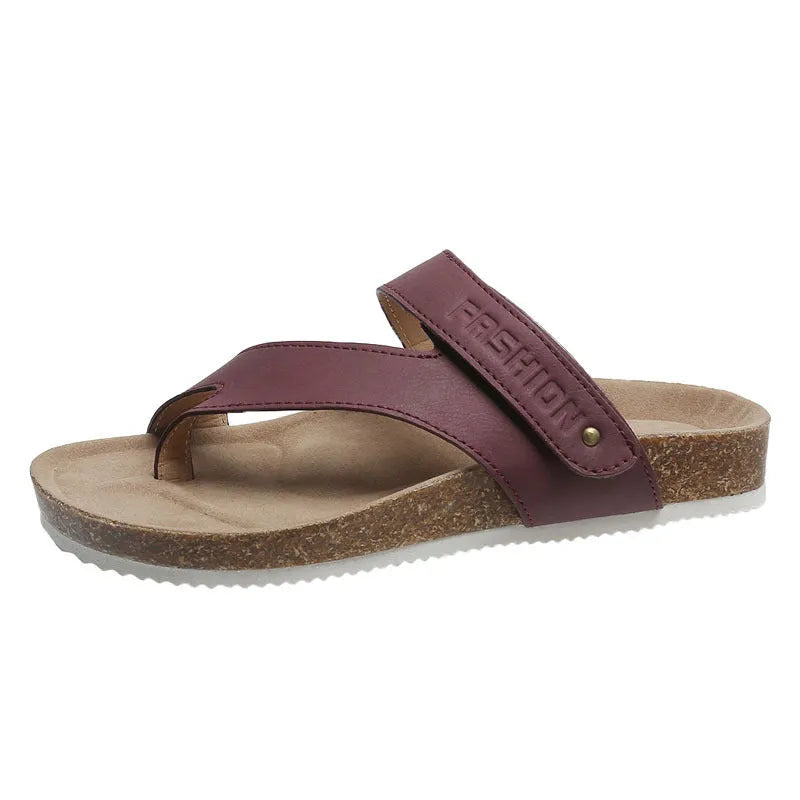 Women's flat toe ring flip-flop in a solid colour with a thick foam sole.