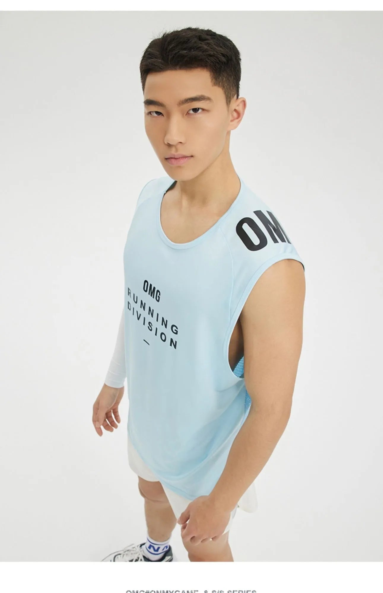 Men's mesh sports vest in black with loose fit design and letter pattern