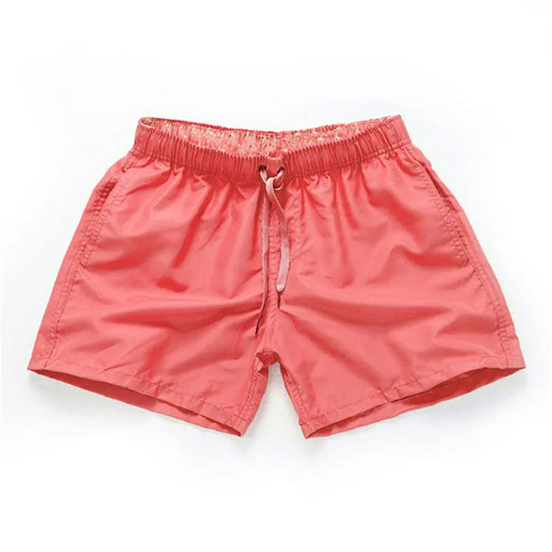 Men's polyester beach shorts in multiple colours with straight leg design for surfing and casual wear