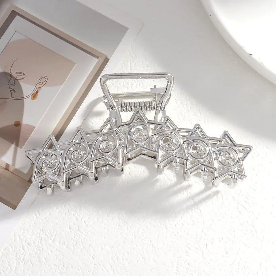 Silver metal hair barrette claw clip with electroplated finish and decorative design