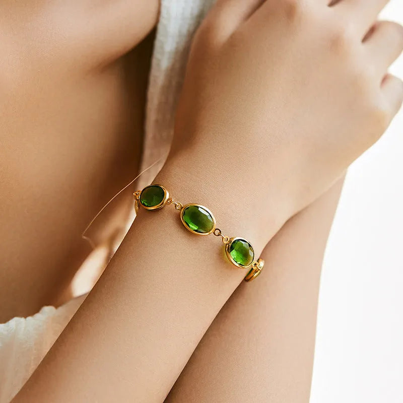 Women's geometric bracelet with blue glass inlay on a copper band.