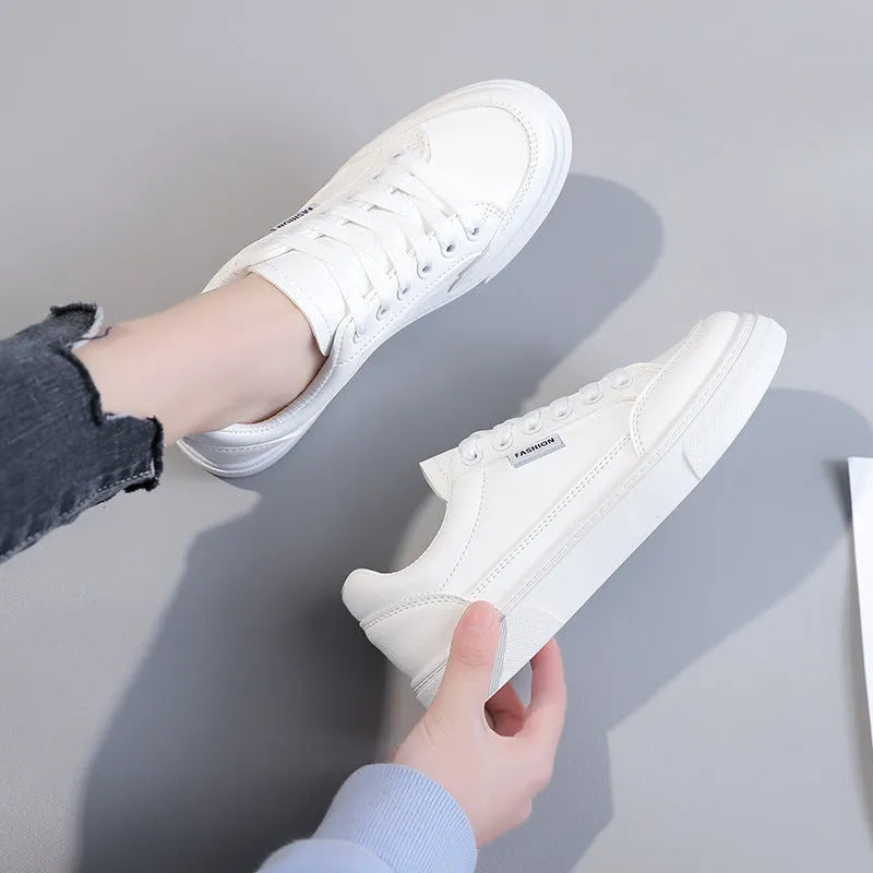 Women's white and brown Korean-style low-top sneakers with artificial PU upper and plastic sole.