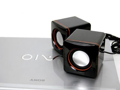 Black square USB-powered 2.0 computer speaker for 700B models on desktop