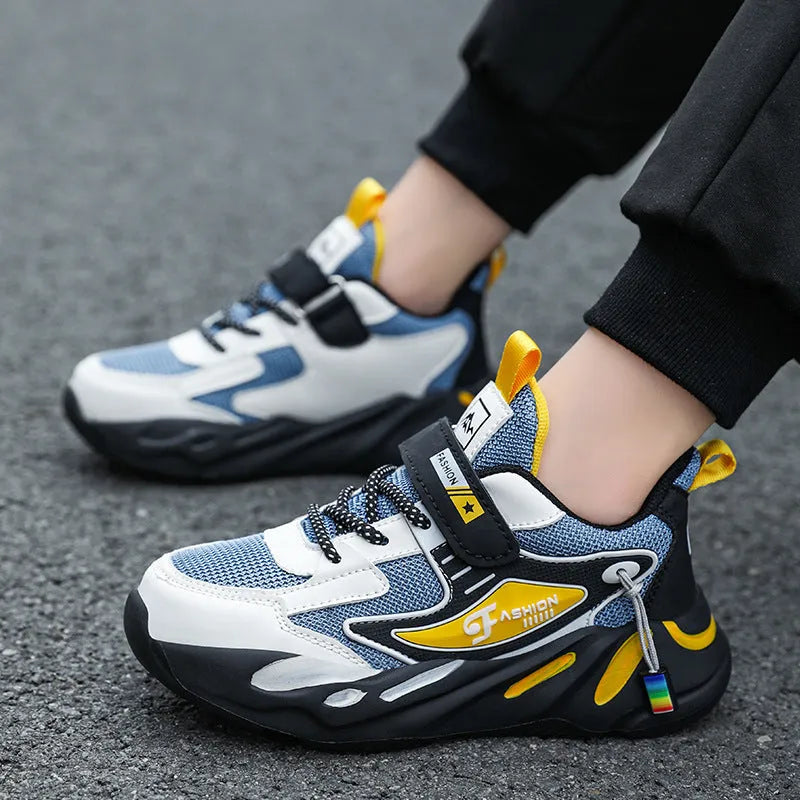 Boy's dark blue and black Velcro-fastened platform sports running shoes with breathable mesh upper.