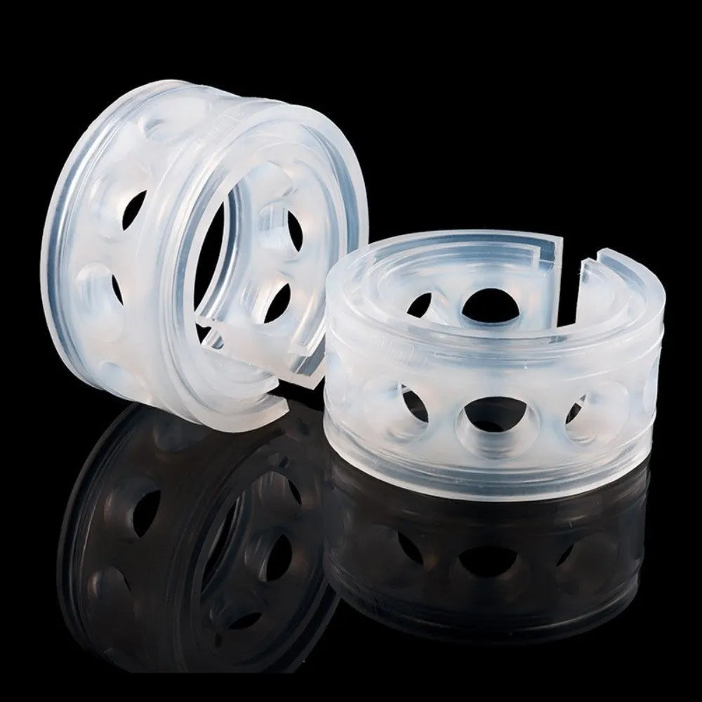 Two transparent rubber shock absorber buffers for car suspension springs, shown with size measurement diagram.