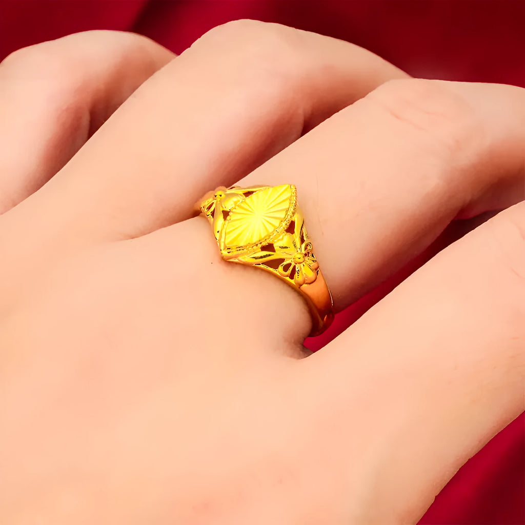 Alluvial gold open diamond flower ring with geometric textured design on brass with electroplated finish.