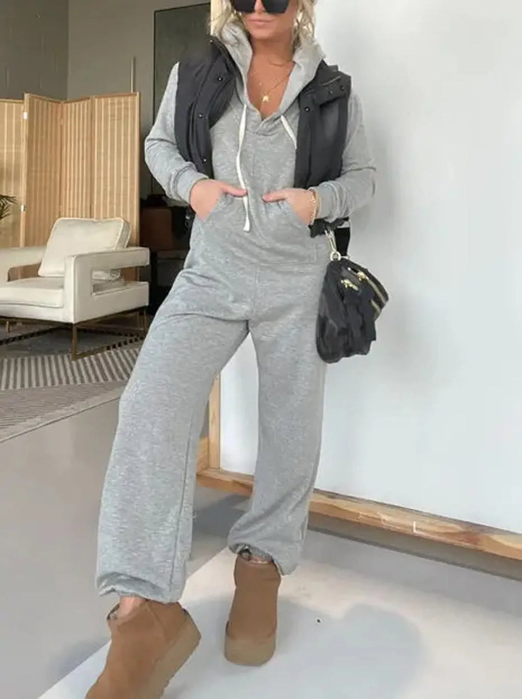 Solid colour spandex hoodie jumpsuit with front pocket in black