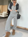 Solid colour spandex hoodie jumpsuit with front pocket in black