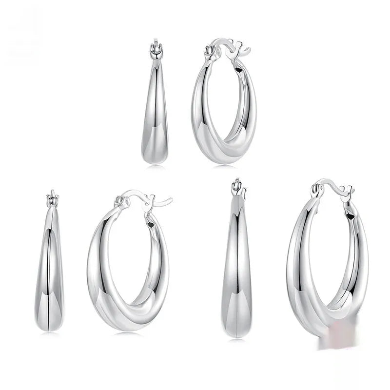Women's copper ring clip earrings with electroplating treatment in three size options