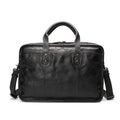 Large vintage leather men's briefcase with internal computer and camera pockets measuring 42cm wide
