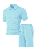 Men's patterned cloth casual suit set featuring a short sleeve polo shirt and trousers on a hanger.