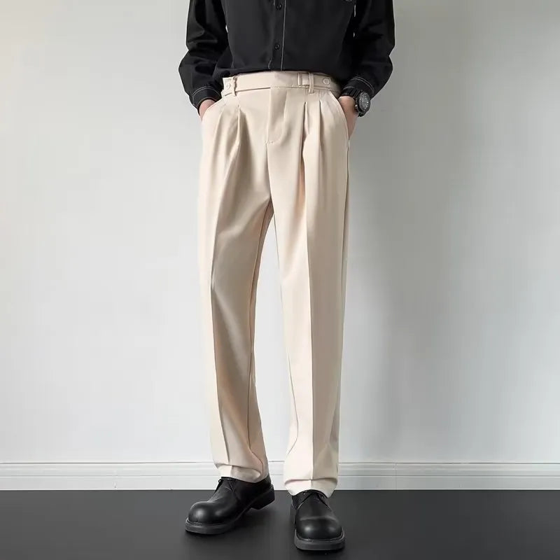 Men's straight-leg loose fit suit trousers in apricot colour on a hanger.