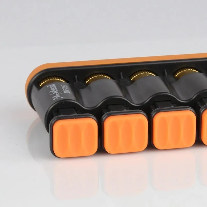 Grey and orange silicone finger trainer for musician hand strength development