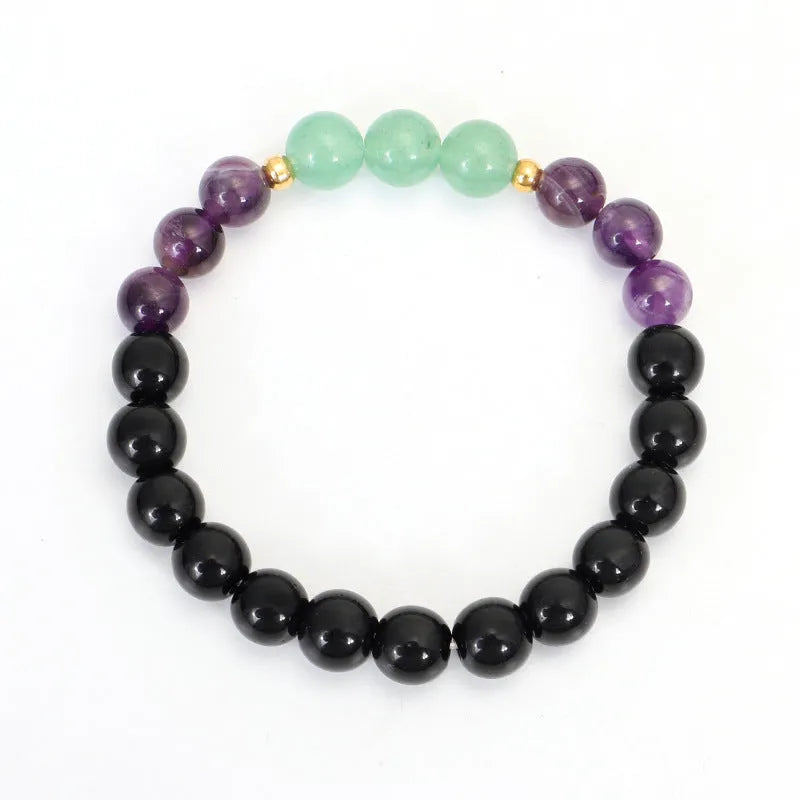 Yoga lotus pendant necklace with handmade stone beads and matching bracelet on adjustable chain.