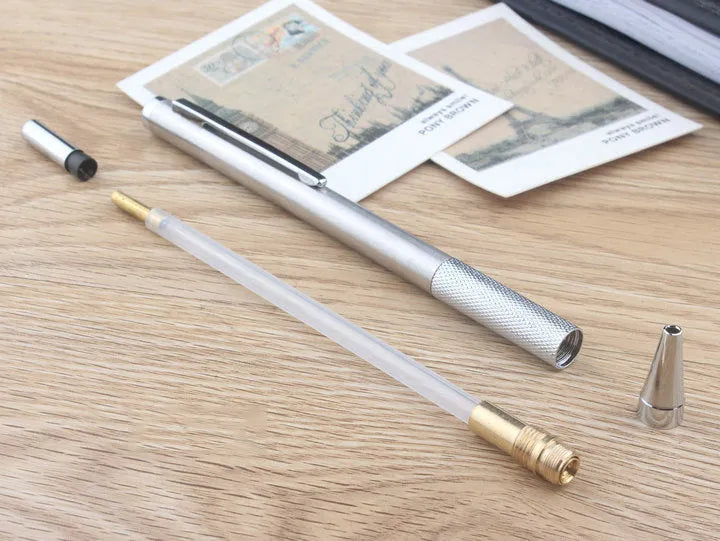 Metal automatic mechanical pencil showing barrel detail and lead size options from 0.5mm to 2.0mm
