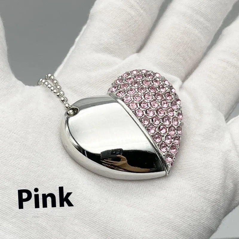 Blue heart-shaped metal USB flash drive with a brick pattern design on a white background.