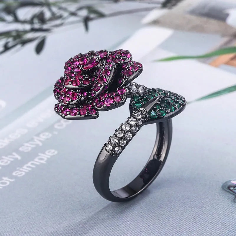 Black gold colour women's ring with geometric flower design and simulation red corundum stone