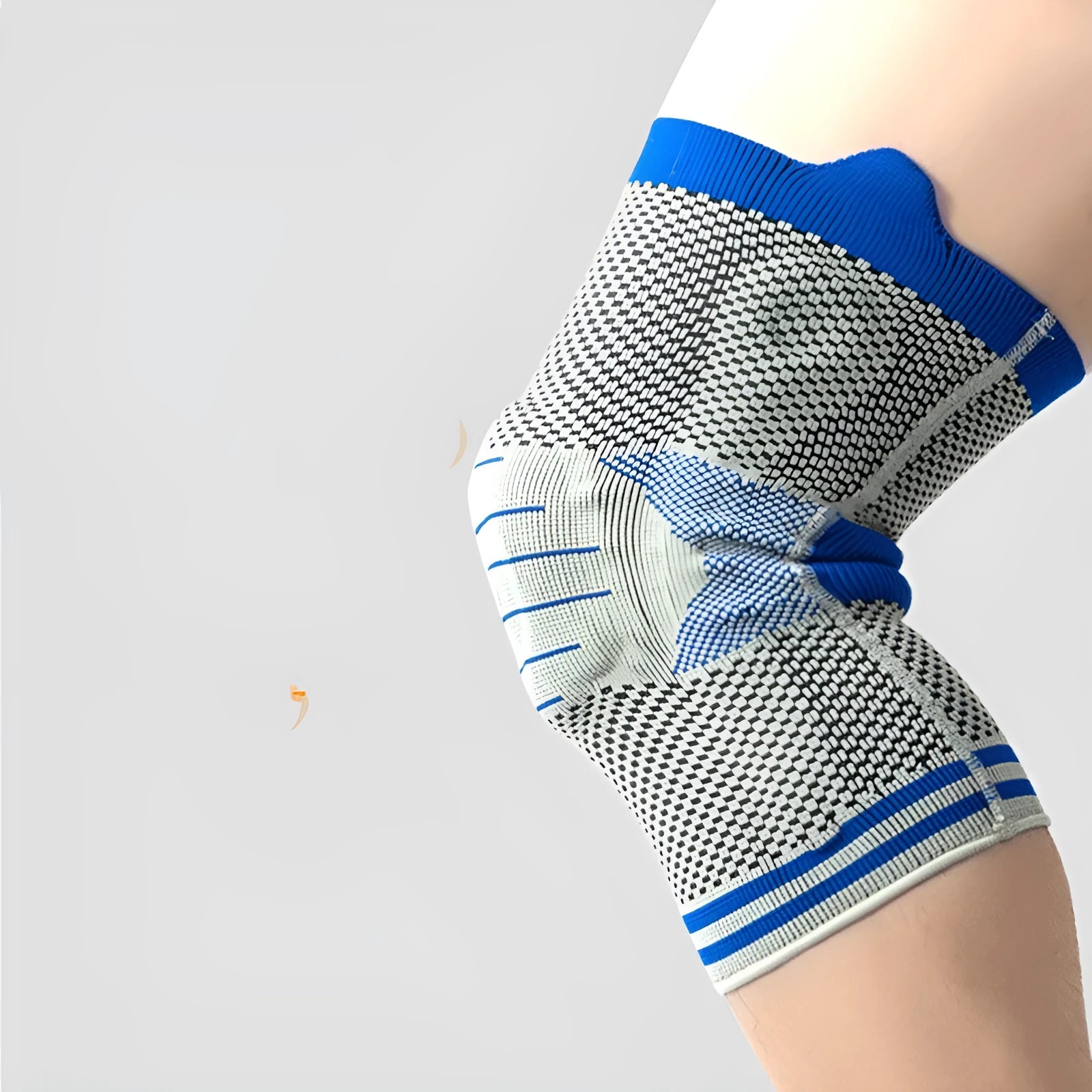 Cotton knee pads with silicone massage and spring bar shock absorber in black and blue colour combination.