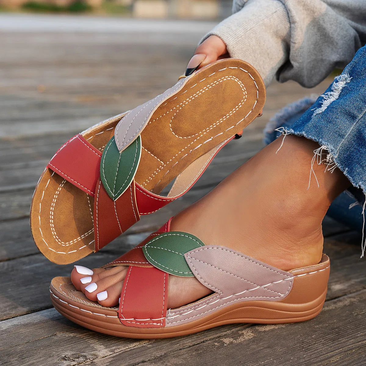 Women's black thick-soled slippers with cross-straps and a peep-toe