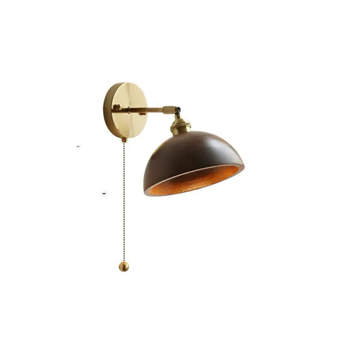 Nordic style wooden wall lamp with walnut finish mounted beside a bed