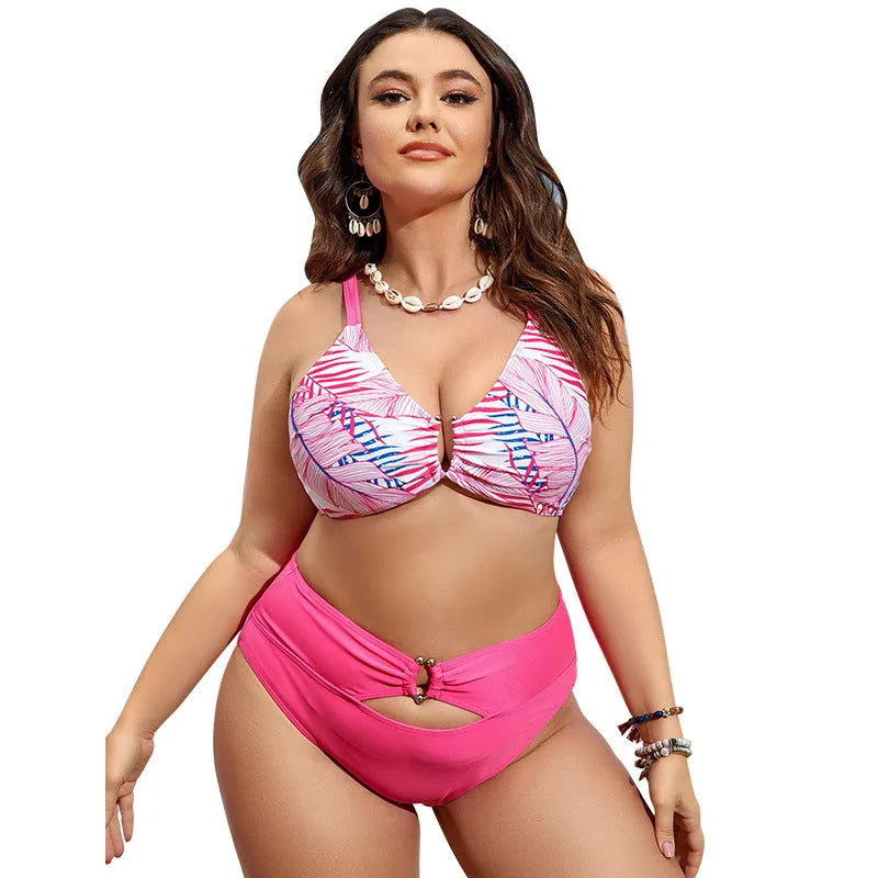 Pink floral plus size women's swimsuit with vintage bikini straps in extended sizes
