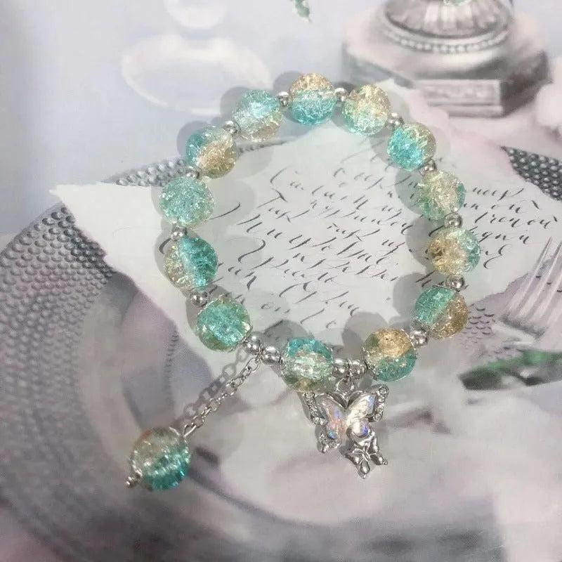 Handmade Chinese style glass bracelet with bamboo joint beads in a red Lvzhu Duobao design.