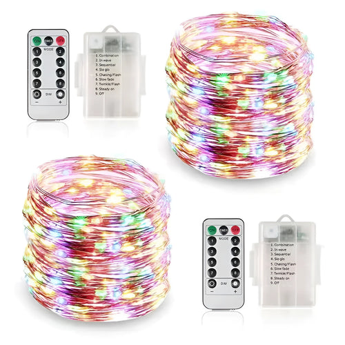 Copper wire battery-operated string lights wrapped around branch with multiple LED colours illuminated