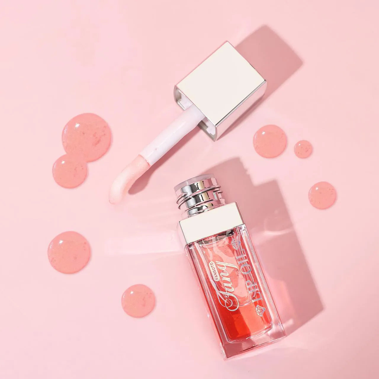 Bright mint lip gloss tube with five colour options showing moisturising and repairing lipstick