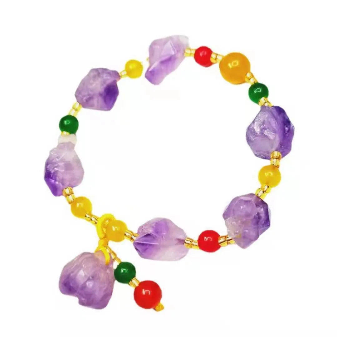Women's natural amethyst shaped bead bracelet with a fu character charm.