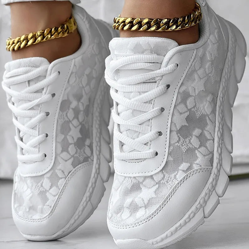 Women's casual canvas running shoes in white, black, blue or pink with flat heel and round toe design