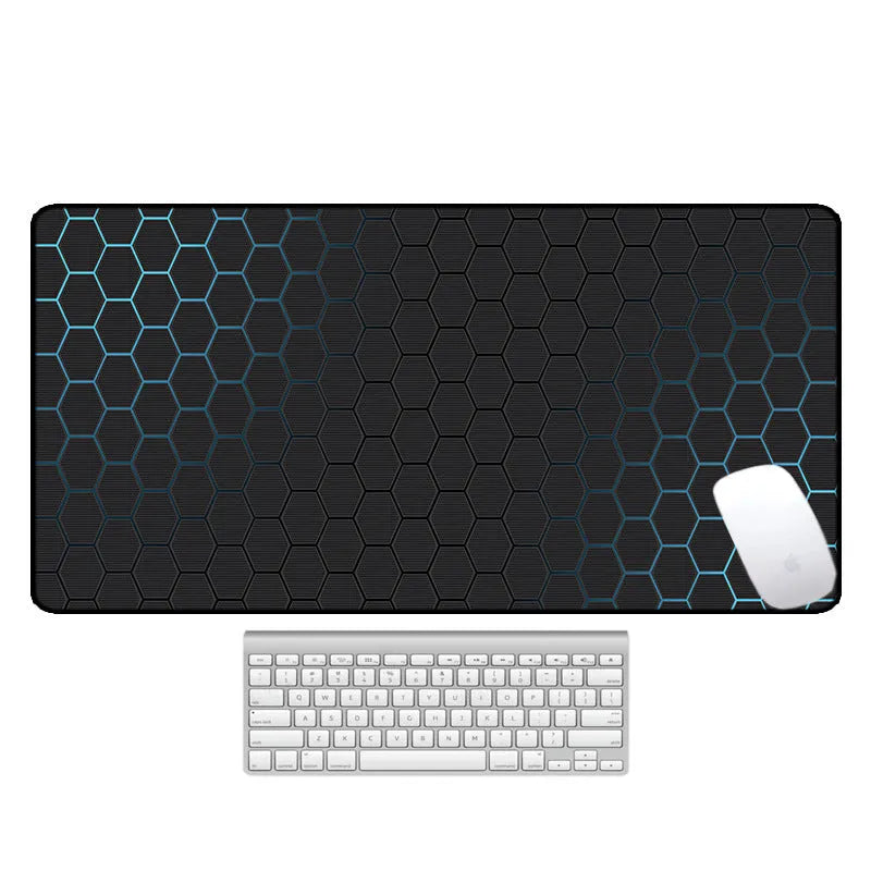 Large thermal transfer printed mouse pad with natural rubber non-slip base on a desk.