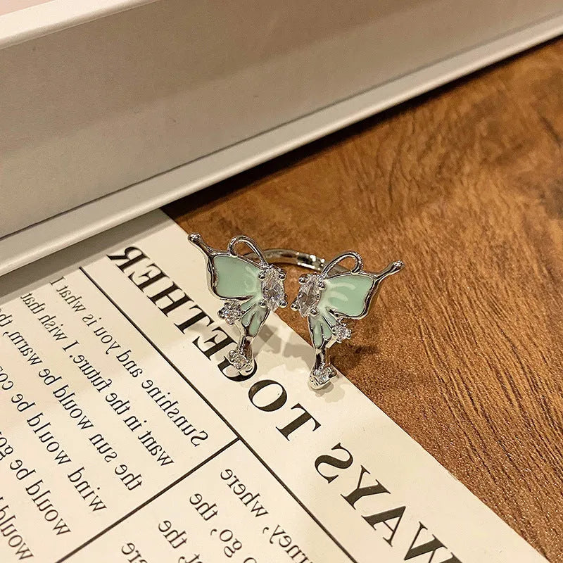 Copper Chinese butterfly women's ring showing creative design with oil dripping treatment finish
