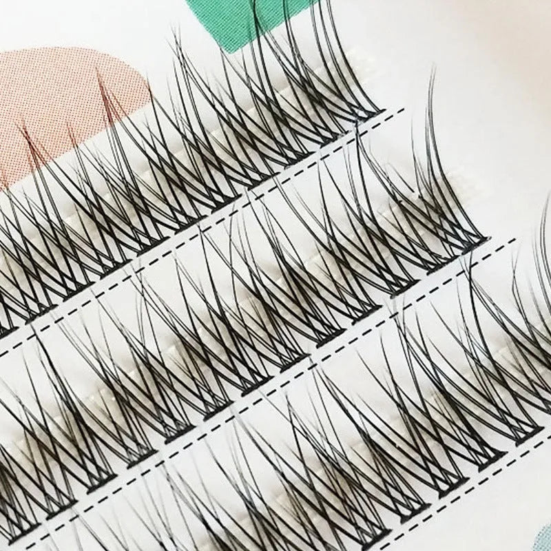 Black V-shaped fairy fishtail false eyelashes showing thick segment design and multiple length options.