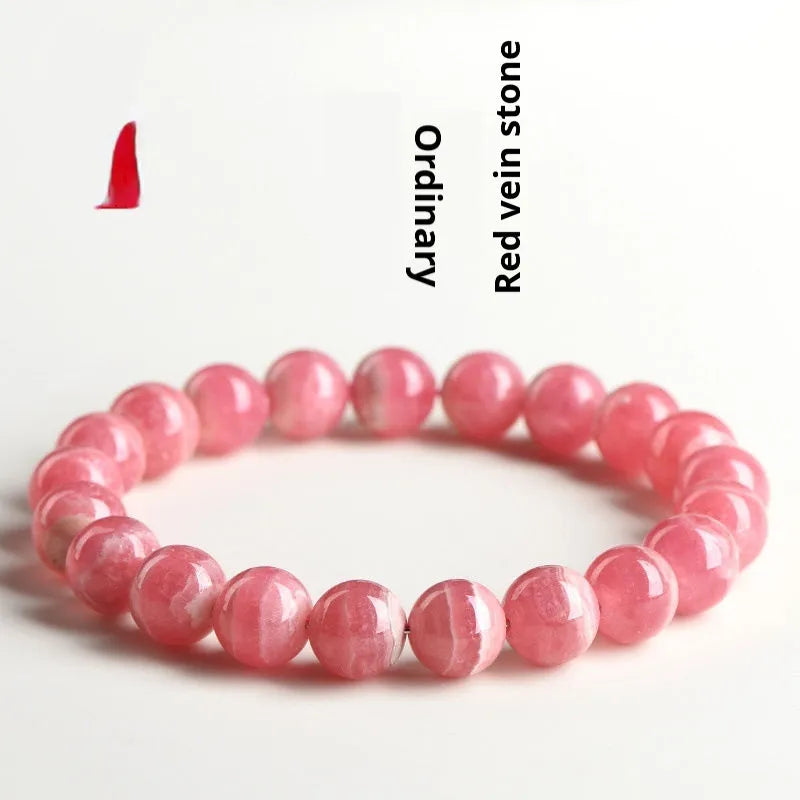 Women's red rhodochrosite crystal bracelet with geometric design and longevity lock fastening