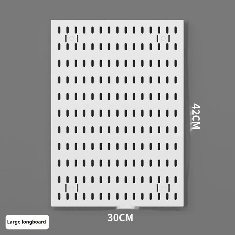 White punch-free plastic wire-wrap board storage rack mounted on a wall with hooks