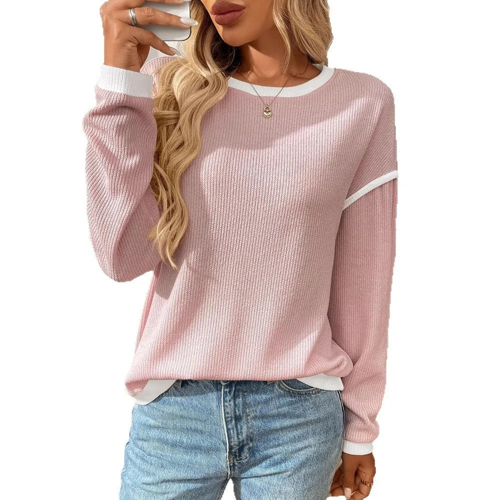 Women's loose round neck long sleeve polyester pullover top shown in one of seven available colours.