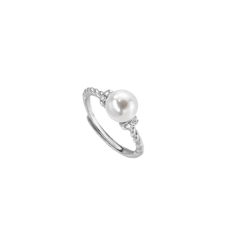 Adjustable copper pearl ring with geometric antique twist design in gold and silver finish options