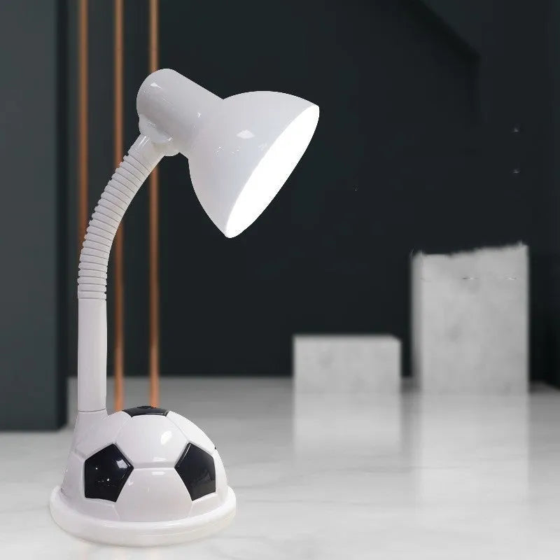 White ABS student desk lamp with flex neck and rectangular base on flat surface