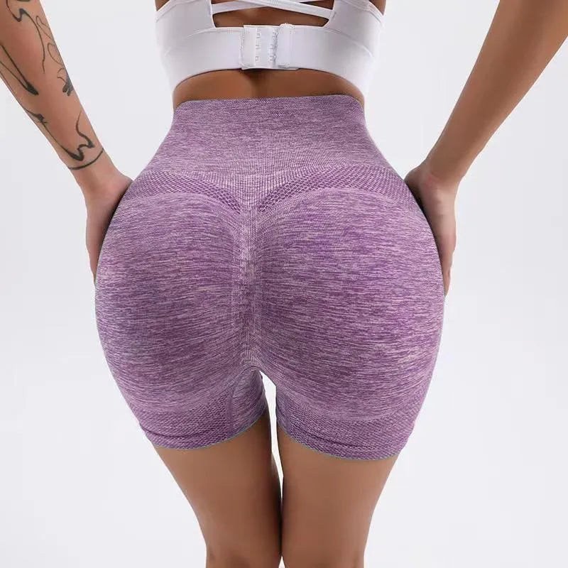 Women's high-waist yoga shorts in quick-dry fabric with seamless waistband for fitness activities