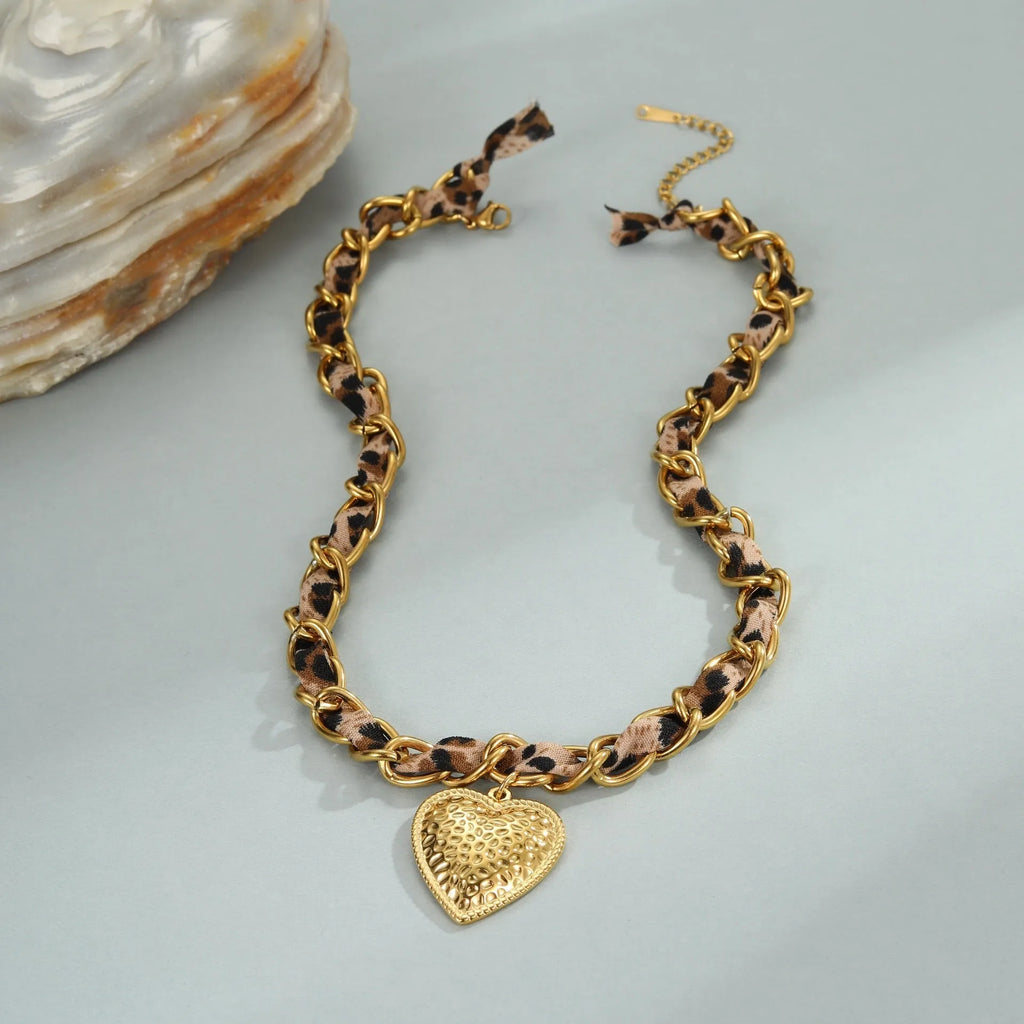 Geometric leopard and love pendant necklace on adjustable stainless steel chain with 18K electroplating