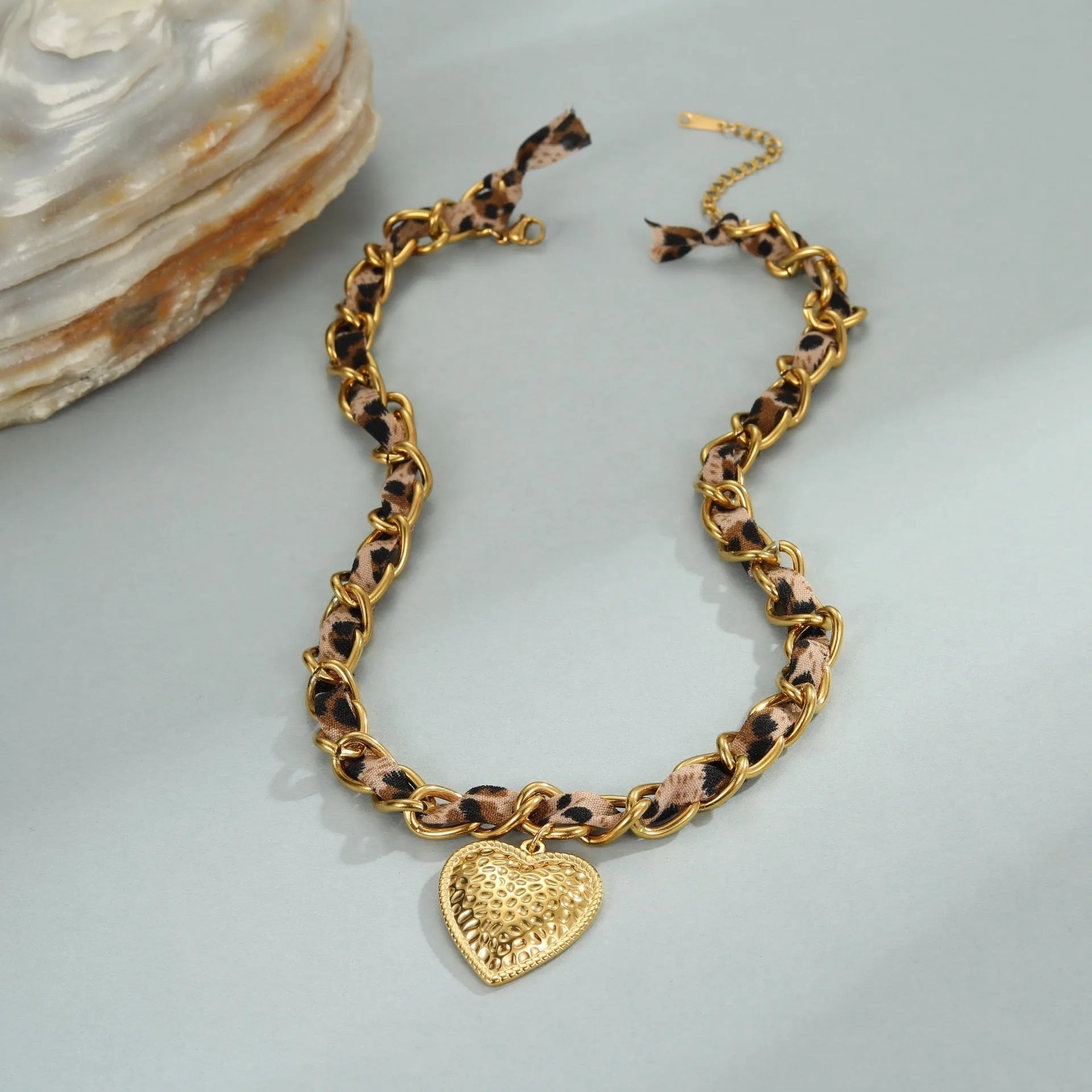 Geometric leopard and love pendant necklace on adjustable stainless steel chain with 18K electroplating