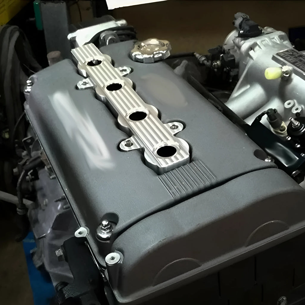 Aluminium engine housing panel in blue, red, and silver colours, showing versions with and without holes.