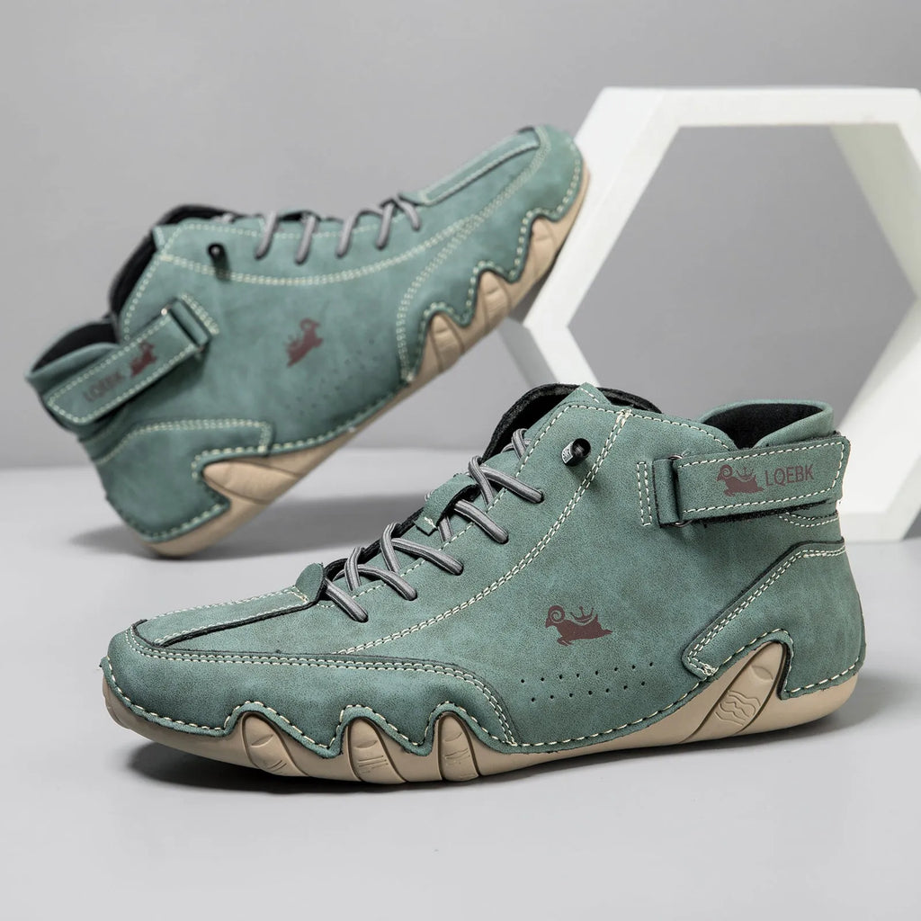 Men's brown high-top octopus Martin boots with a round toe and visible stitching on a flat rubber sole.