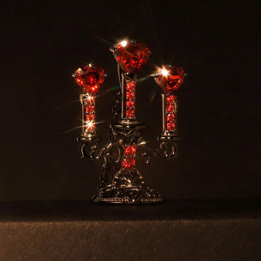 Gothic-style zinc alloy clavicle necklace featuring a hollow candlestick pendant and cross chain in a retro finish.