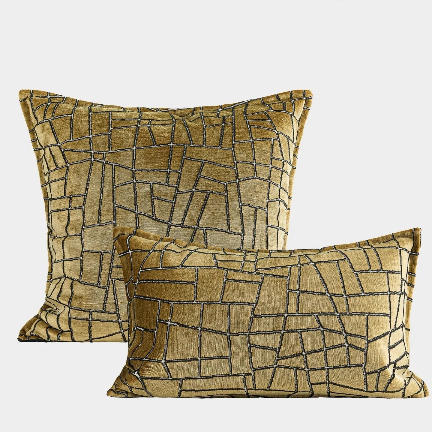 Tuhao gold geometric abstract pattern on a square decorative cushion with tassel detail.