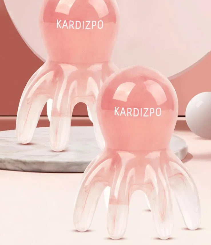 Pink octopus-shaped massage comb made from natural resin with storage bag